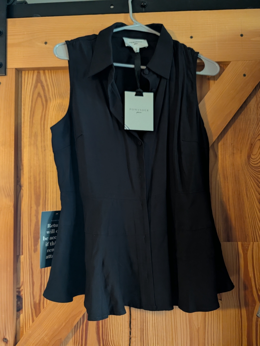 Tuckernuck Black Sleeveless Button-Front Peplum Blouse